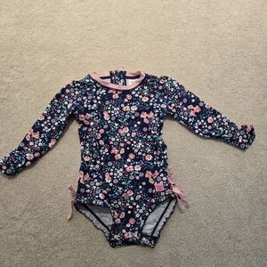 Rufflebutts long sleeve one piece rashguard